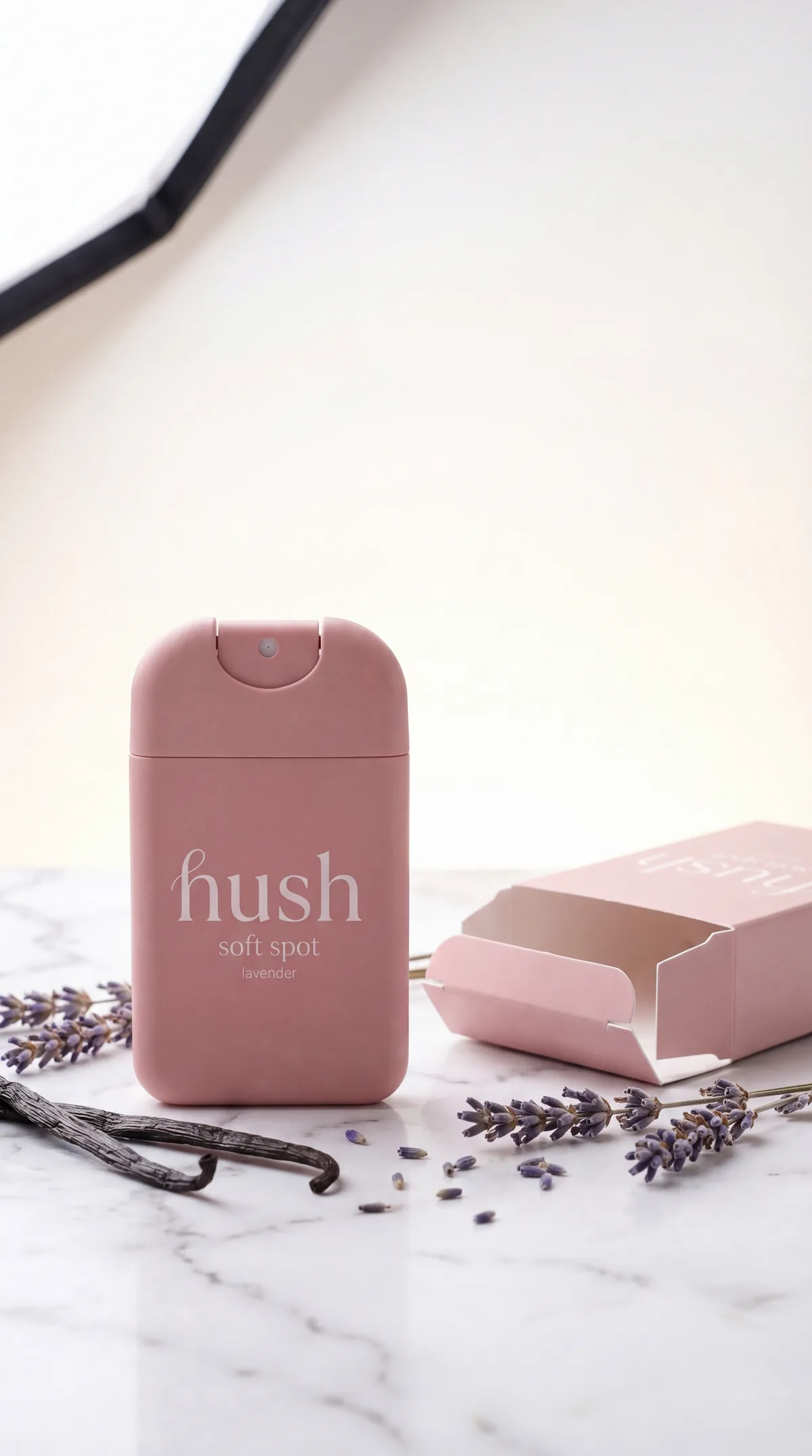 Hush Soft Spot with lavender bundle and box on marble, warm afternoon light